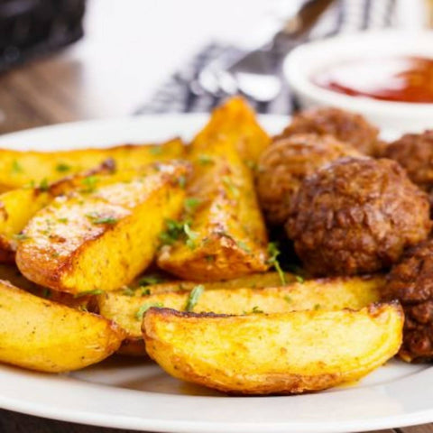 Fried turkey with slice fried sweet potatoes